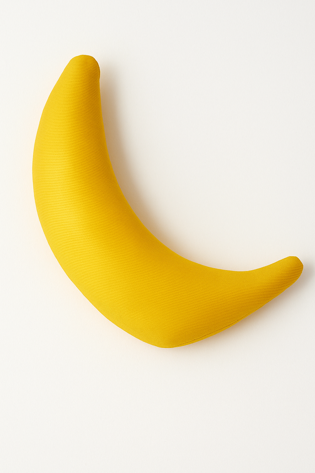 Yellow catnip banana toy for cats to kick, bite, and play with